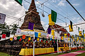 Thailand, Old Sukhothai - Wat Traphang Thong, white threads adorn the temple ground for the ceremony.